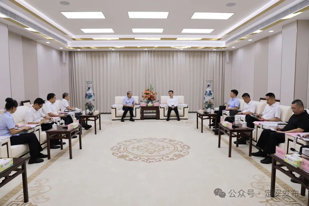 王英诚会见中国移动海南公司党委书记、总经理丘文辉